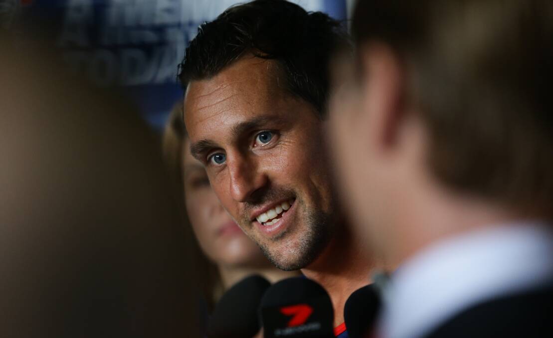 Excited: Mitchell Pearce was all smiles at his first press conference as a Newcastle Knight at Mayfield Balance on Monday. Picture: Jonathan Carroll
