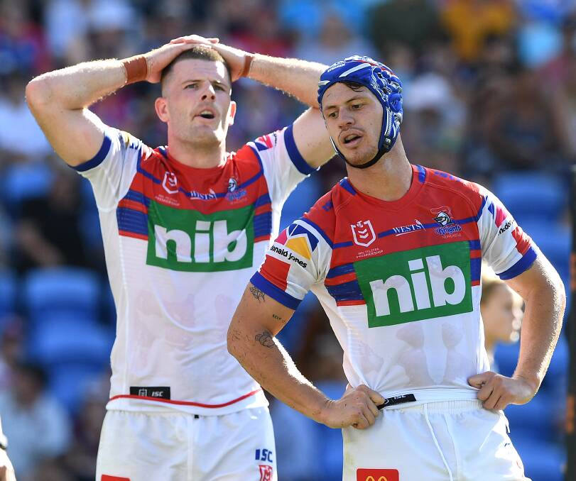 Lachlan Fitzgibbon and Kalyn Ponga contemplate another defeat.