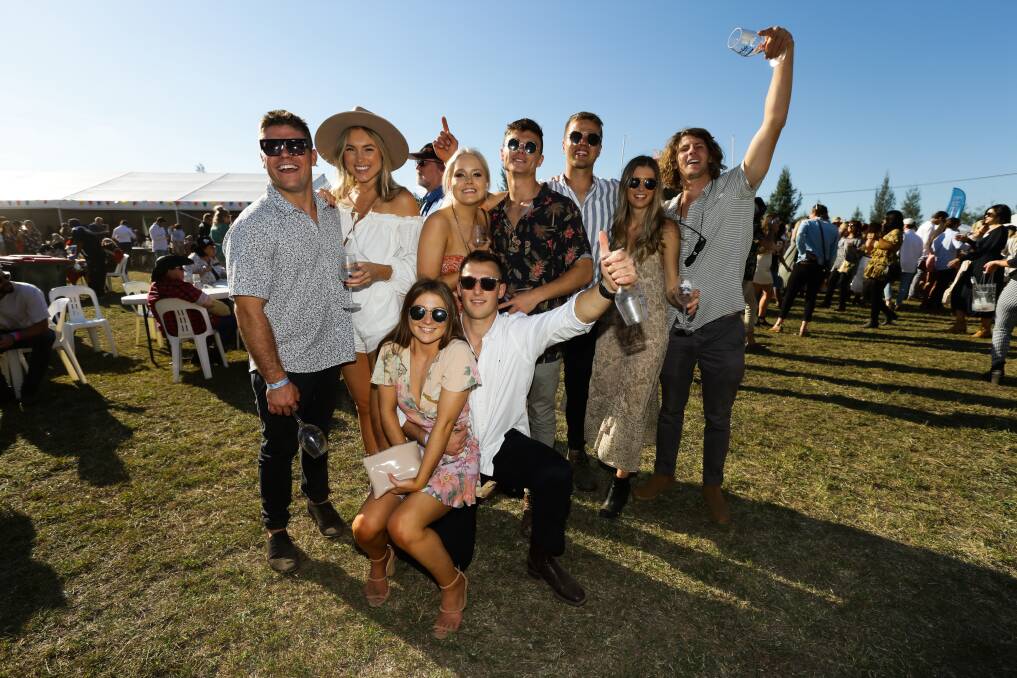 CATCH UP: Busloads of revellers moved between wineries for the annual Hunter Valley event.