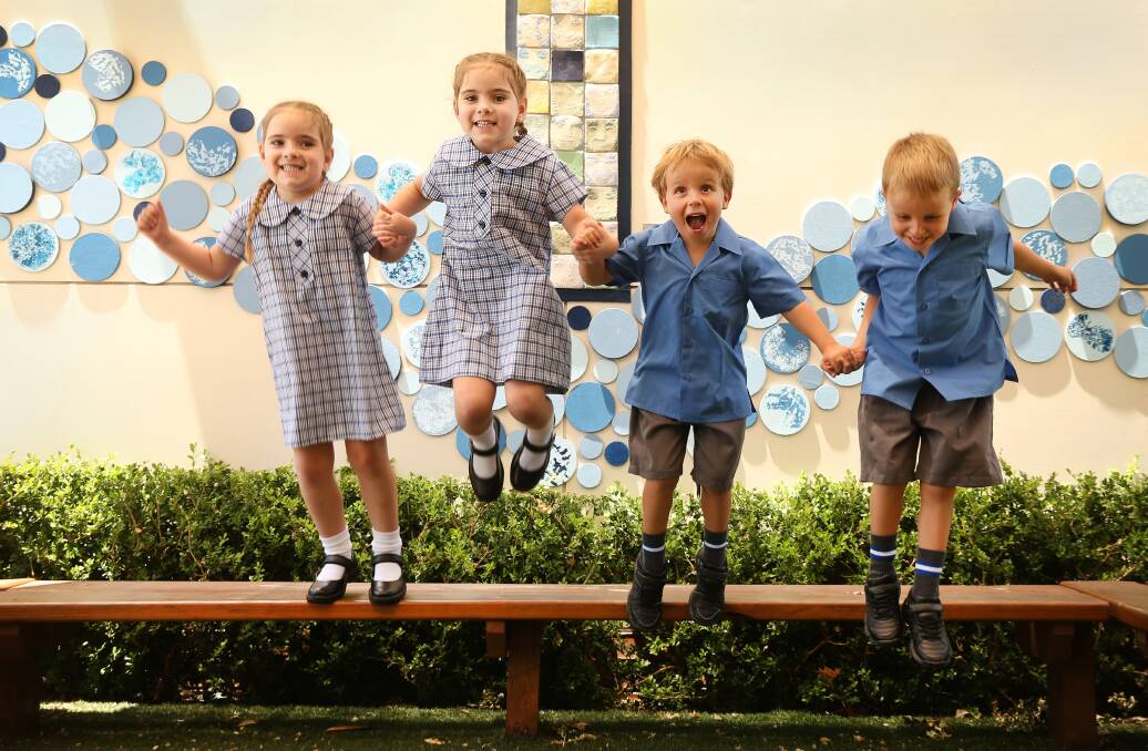 All smiles: Mackenzie Hill and Scarlett Hill with Charlie Lunn and Hamish Lunn. Picture: Marina Neil
