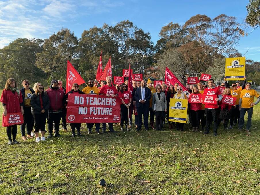 One voice: Federation deputy president Henry Rajendra and IEU NSW/ACT deputy secretary Carol Matthews met with teachers in Newcastle on Wednesday, ahead of the historic joint strike on Thursday. 