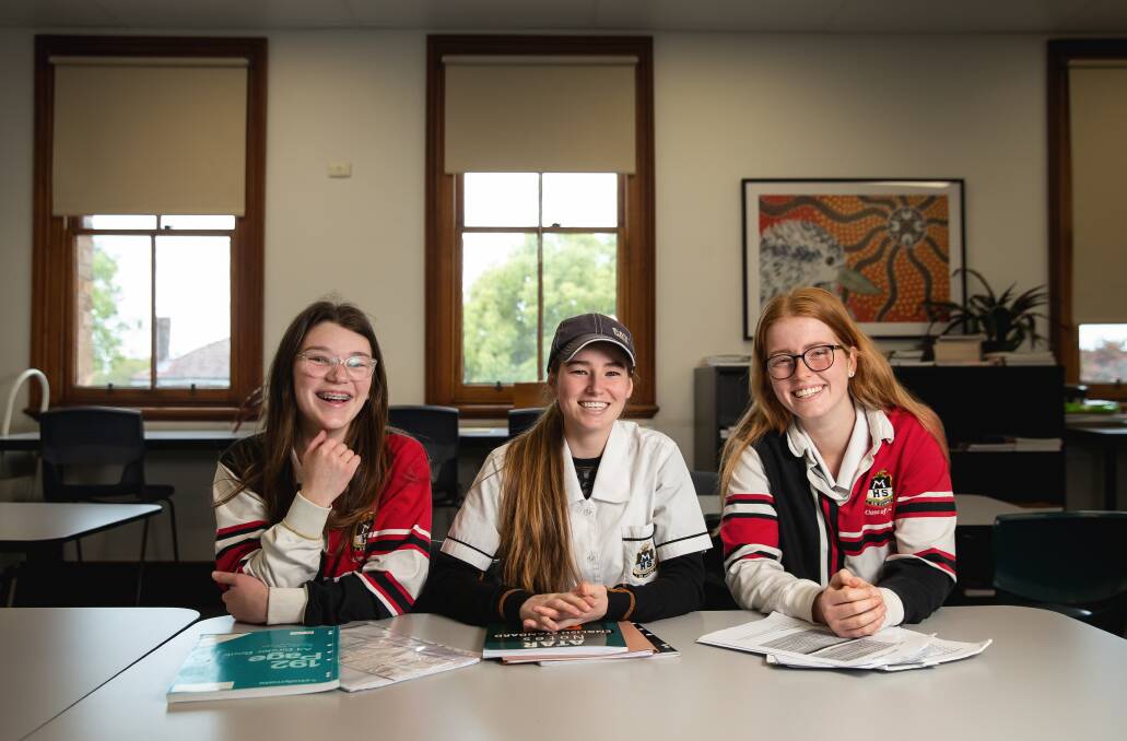 Lily Trench, Georgia Collins and Emily Baldwin. Emily said the HSC wasn't as daunting as she'd pictured and success felt more achievable than a few years ago. Georgia said she was "surprisingly calm" and taking exams one day at a time. Lily said wasn't stressed. Picture by Marina Neil