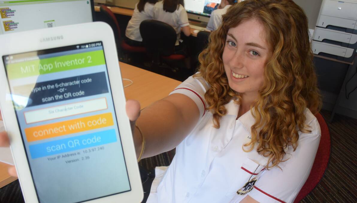 BRIGHT IDEA: Maitland High School student Lara Jukes, 14, is building an app that organises all community events in one place. Picture: BRODIE OWEN