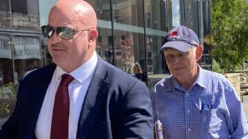 FRAUD: Veteran Maitland accountant Michael Unicomb, right, with his solicitor Mark Ramsland outside Newcastle District Court last year after pleading guilty to obtaining financial advantage by deception.