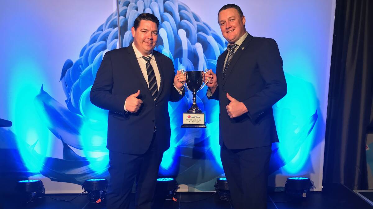 PRIZE: Maitland Blacks president Pat Howard (seniors) and Dan Leadley (juniors) with the Rugby NSW club of the year award in Sydney on Thursday night. Picture: Supplied