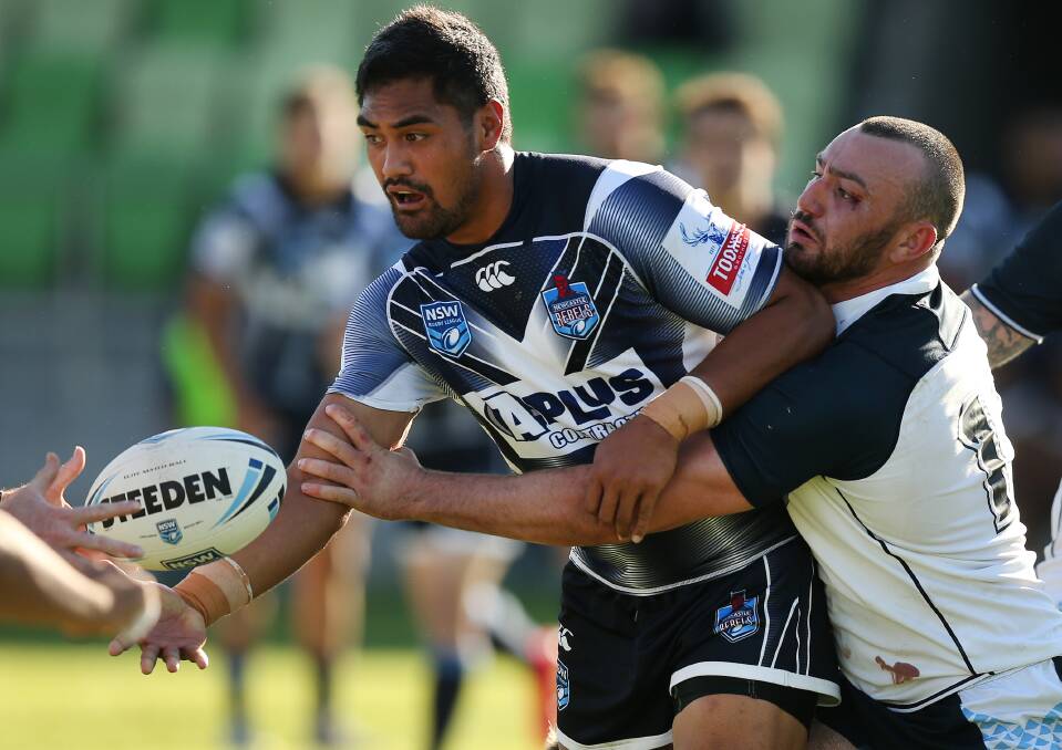SET: Pat Mata'utia playing for the Rebels against a Ron Massey Cup side last year. Picture: Marina Neil