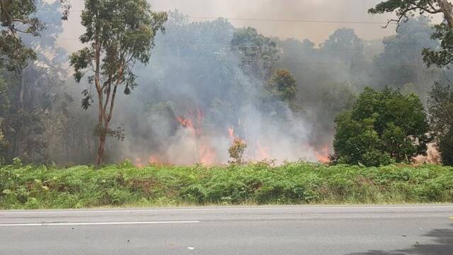 BURNING: The fire is burning north of Newcastle Airport. Picture: NSW RFS