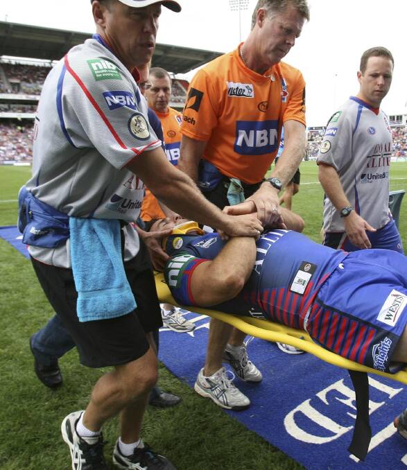 THEN: Johns is taken off after a Sonny Bill Williams hit in 2007. Picture: Darren Pateman