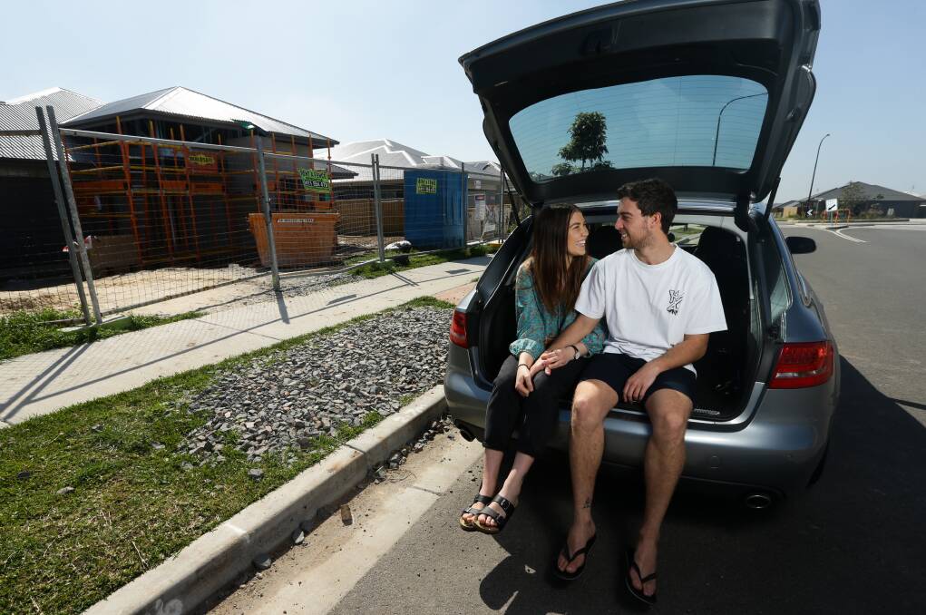 SUCCESSFUL TACTIC: Gabrielle Lyth and Mitchell Cook slept in their car to ensure they secured the block they wanted when the fifth and final stage of Wirraway at Thornton was released. Picture: Jonathan Carroll