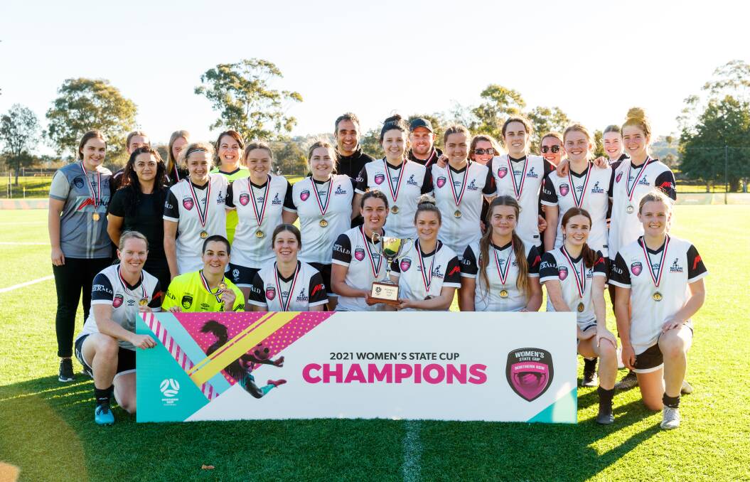 STICKING TOGETHER: Maitland vice-captain Kaitlin Radstaak, pictured holding the NNSWF Women's State Cup trophy with captain Sophie Stapleford, believes the Magpies are laying a strong foundation for future success. Picture: Max Mason-Hubers