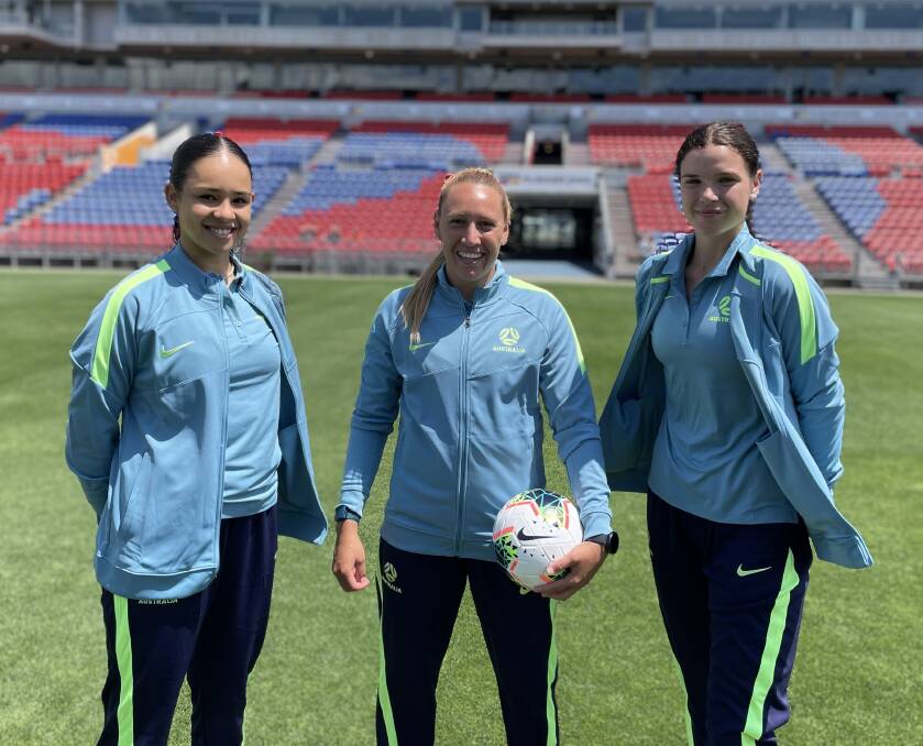 EXCITED: Newcastle's 11-times capped Matilda Gema Simon (middle) pictured with Future Matildas Milan Hammond, left, and Kirsty Fenton, right, at McDonald Jones Stadium. Picture: Renee Valentine