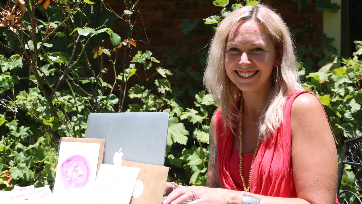 HELPFUL: Kim Oakhill, Medowie, runs Helpful Love from her laptop at home. The thriving enterprise is about to go national, helping more people than ever before. Picture: Kia Woodmore