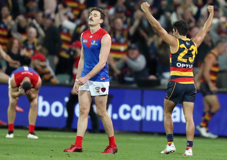 Melbourne was extremely stiff after another poor umpiring decision in Adelaide. Photo: Sarah Reed/AFL Photos via Getty Images