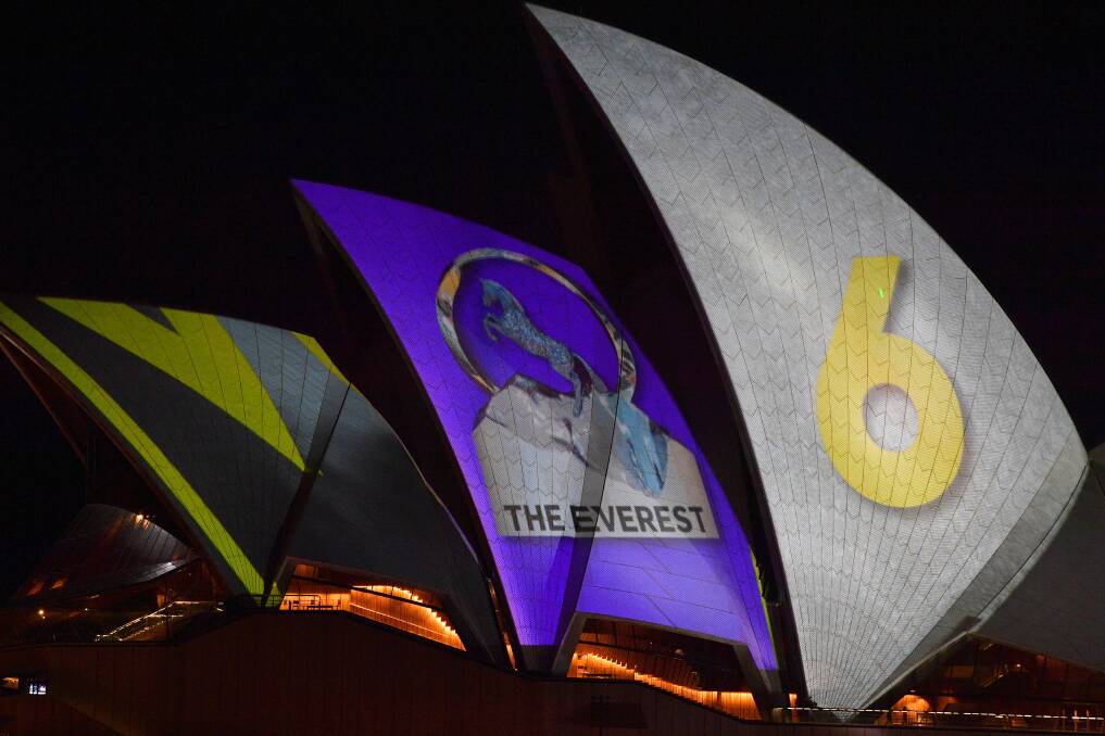 HANG ON: Why all the anger about the promotion of The Everest on the Sydney Opera House sails when it's been done before? Picture: AAP Image/Brendan Esposito
