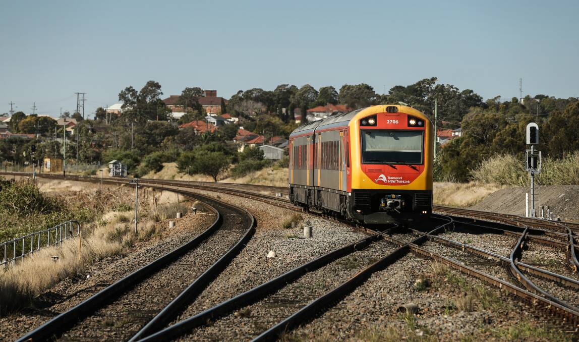 OFF AND RUNNING: A NSW TrainLink service on the Hunter line near Warabrook. More trains are now running between Newcastle and Singleton. Picture: Marina Neil