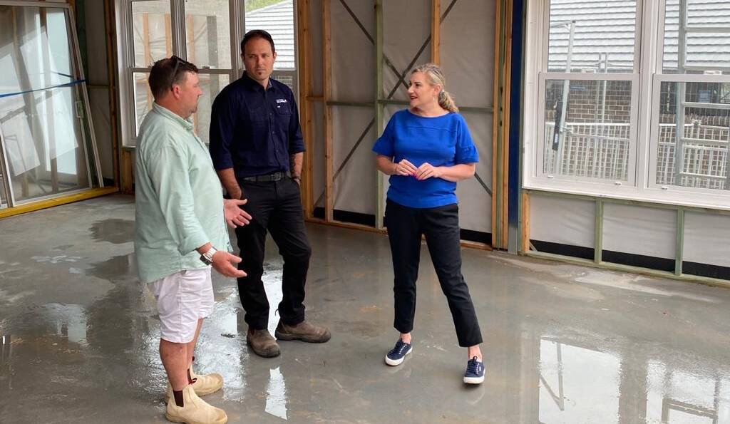 BOOST: Patron senator for the Hunter, Hollie Hughes, speaking withNathan Webster from Narndra Built and Chris Rushford from Certifying Solutions at a home construction site in Boolaroo on Tuesday. Picture: Supplied