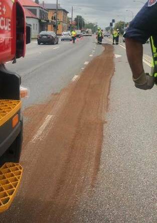 The oil spill at East Maitland is estimated to have stretched around two kilometres along the New England Highway. Picture: Fire & Rescue NSW Station 455 Rutherford