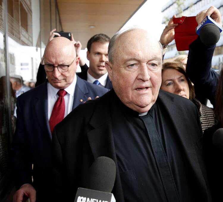 Resign: Adelaide Archbishop Philip Wilson leaves Newcastle Courthouse on Tuesday after his jail sentence for concealing a Hunter priest's child sex crimes. Picture: Darren Pateman.