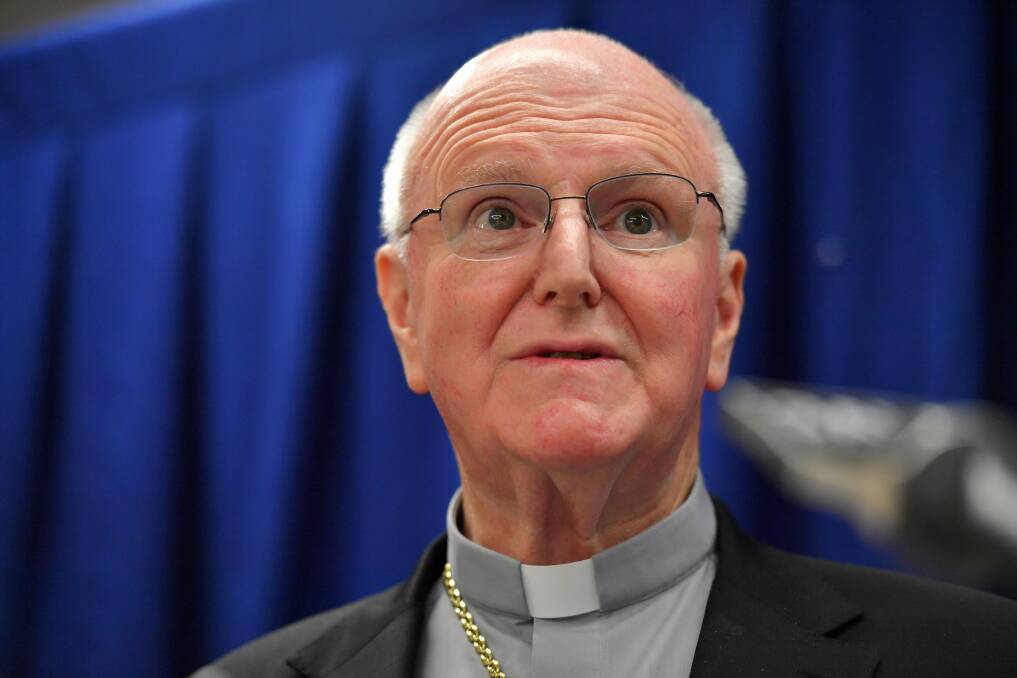 Denial: Archbishop Denis Hart has denied trying to delay signing up to the national redress scheme.