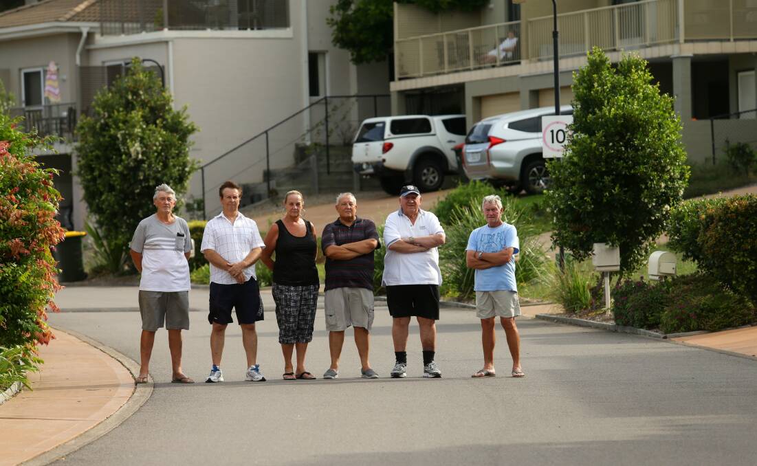 Angry: Lagoons Estate residents who joined a court case against Port Stephens Council over drainage that has left them wet and wild.