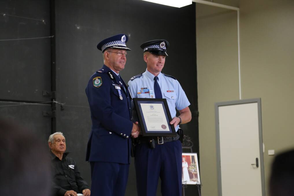 Assistant Commissioner Max Mitchell APM, the Northern Region Commander, presented Snr Cst Mitchell Parker the Commissioner's Commendation for a rescue he performed in Dungog in 2015. 