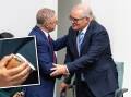 Anthony Albanese shakes Scott MOrrison's hand, and, inset, Mr Morrison's 'ScoMo' bracelet. Pictures by Gary Ramage