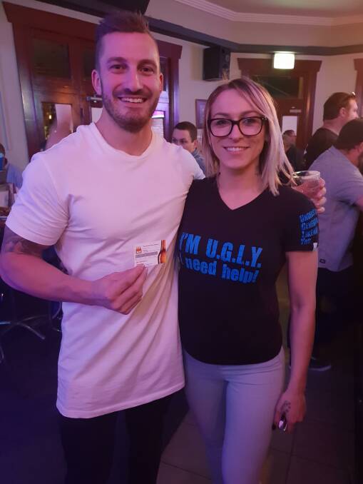 HERE TO HELP: U.G.L.Y. bartender Lily Pinner (right) with her partner Alex Warren. The pair are keen for this weekend's Leukemia Foundation fundraiser.