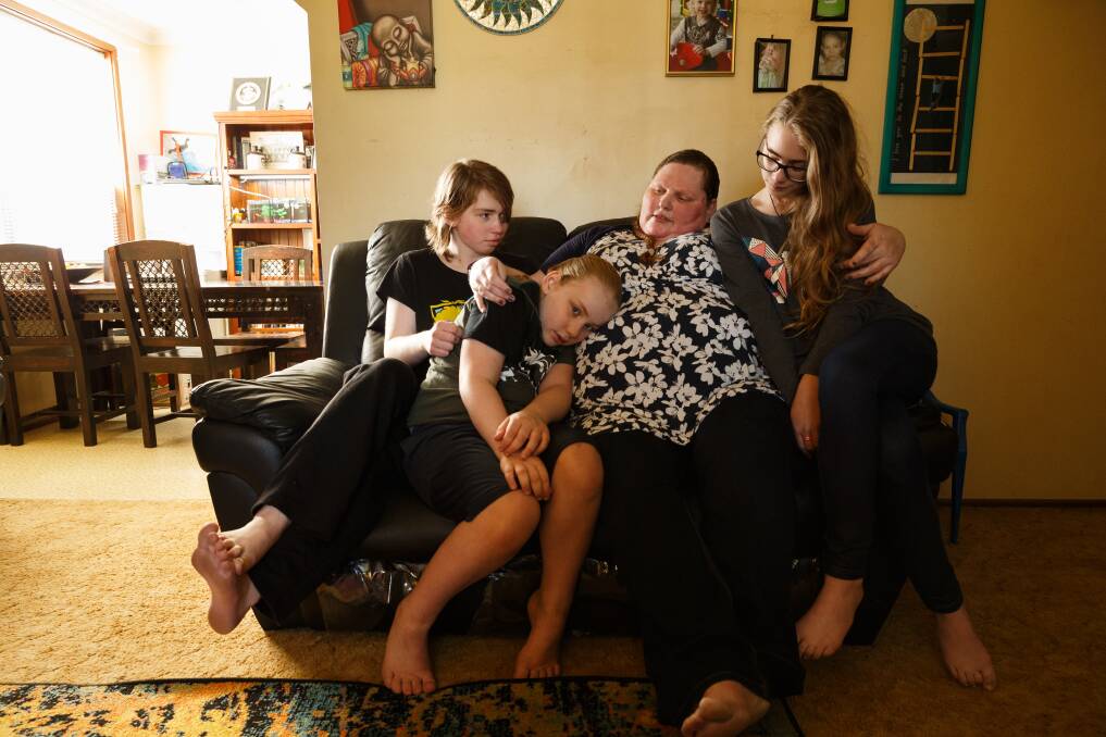 Cohen Young of Woodberry, with his mother Annie and sisters MJ (left), 17, and Imogen, 12, in their home. Picture: Max Mason-Hubers