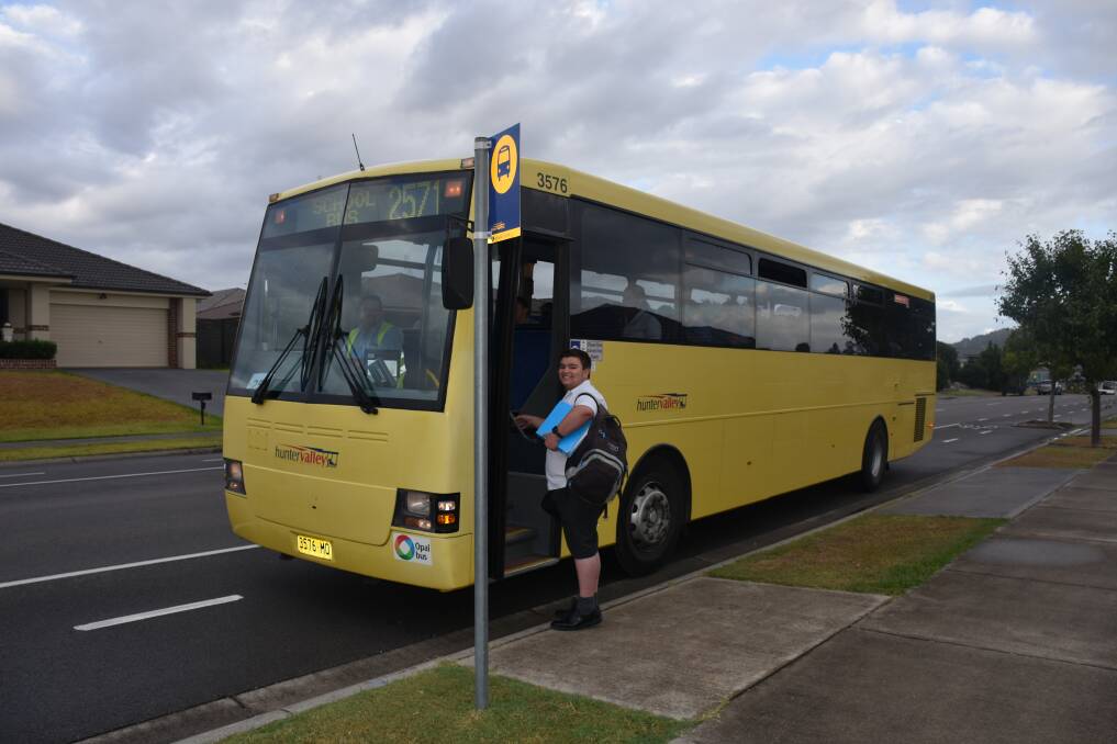 ON THE ROAD AGAIN: Aberglasslyn student Rhys Hughes catching a bus ride to school.
