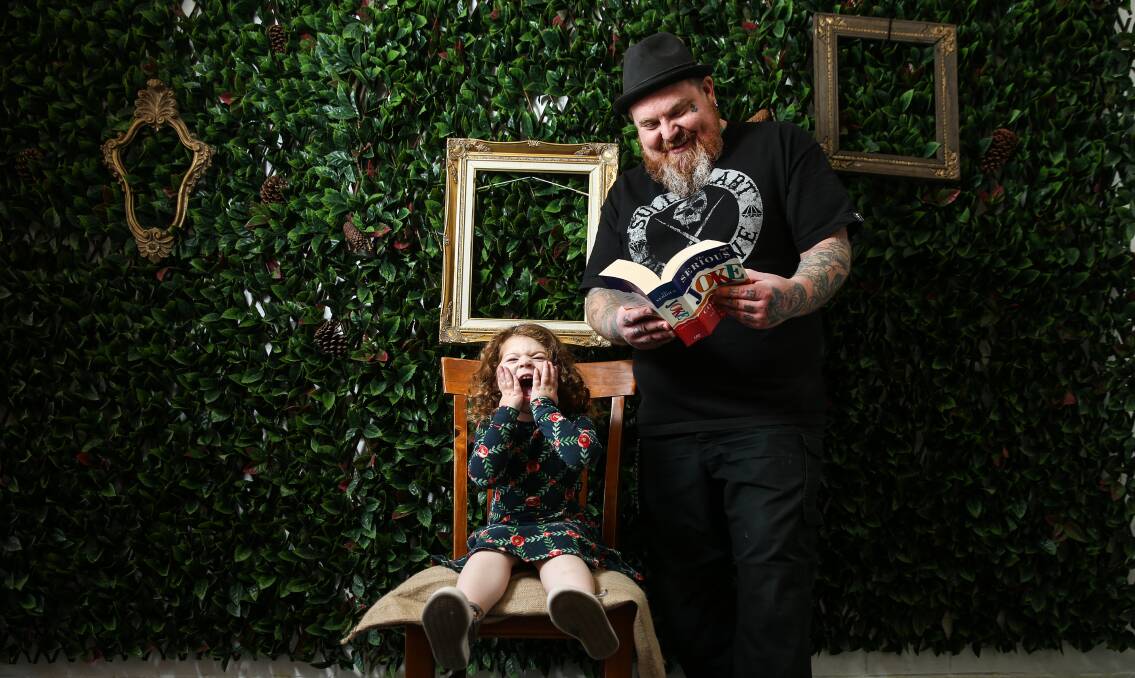 The Cabin Collective owner Dave Bean tests out his dad jokes with daughter Ivy, 3, ahead of their Father's Day Dad Joke Battle on Saturday. Picture: Marina Neil