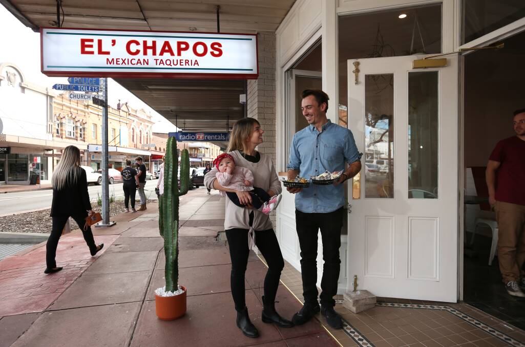 El' Chapos owners Lani and John Elsley with Arden, 3 months, outside their new Mexican restaurant and bar in High Street. Picture: Simone De Peak