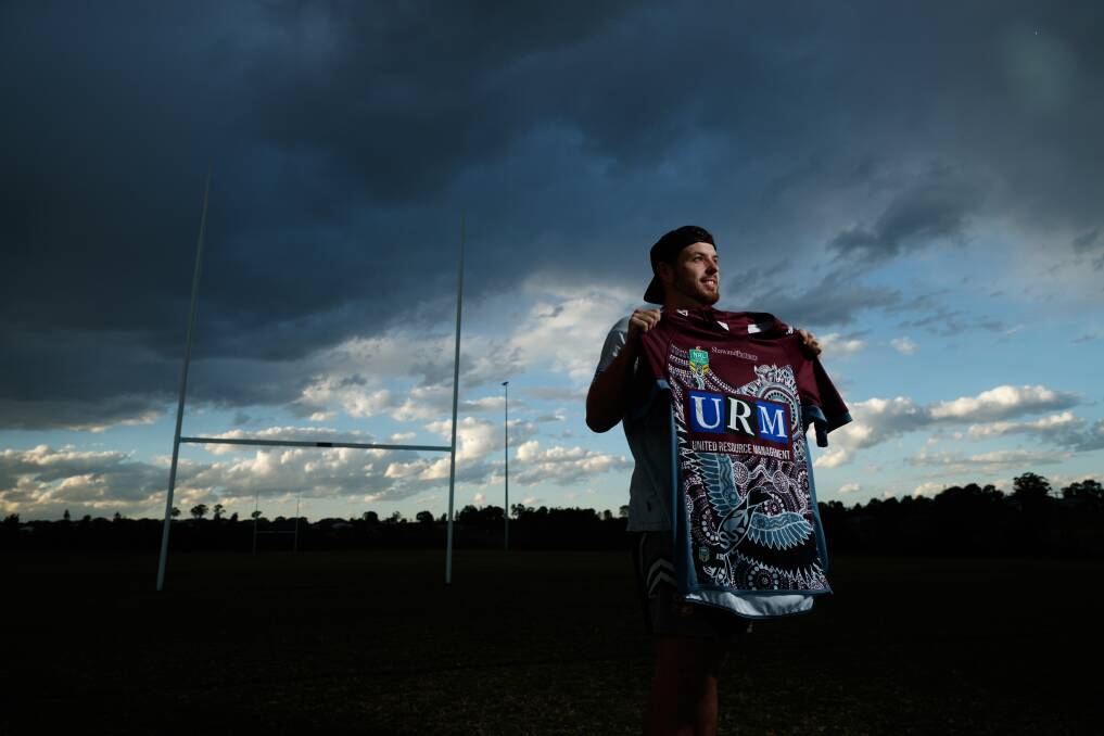 Jakeob Watson from Rutherford designed this year's jersey for the Manly Sea Eagles to wear in the Indigenous round of the NRL. Pictured with the jersey at McKeachie's Oval, Aberglasslyn. Picture: Max Mason-Hubers