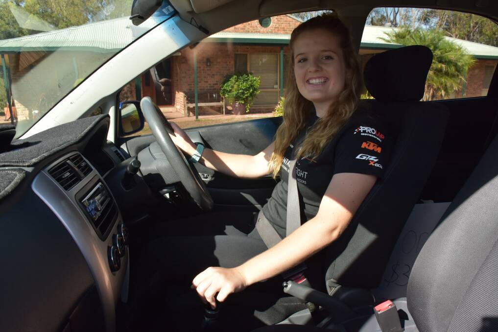 HERE TO HELP: Race car driver Caitlin Wood.