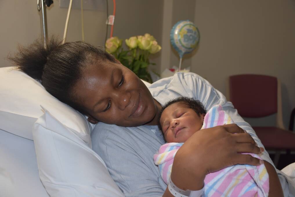 GRATEFUL: Precious Mutetwa with her newborn son Bongani Joshua Luphala - the first baby born at Maitland Hospital in 2018.