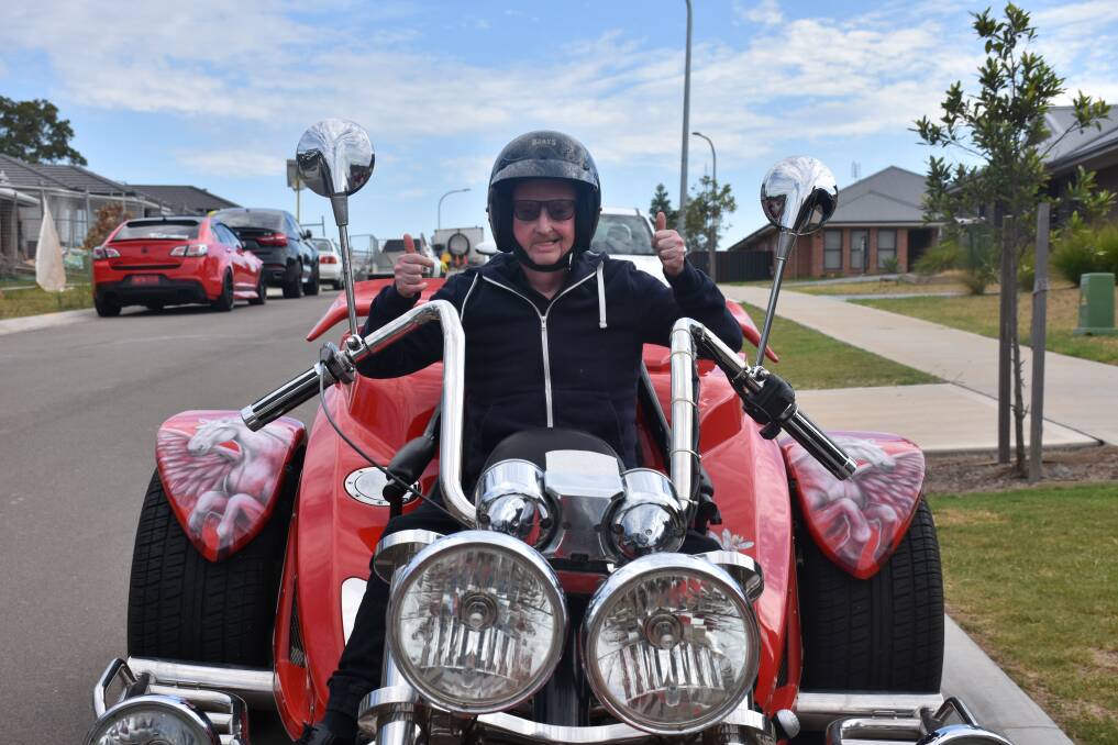 GET YOUR MOTOR RUNNING: Maitland Independent Disability Support participant Trent Clark before his ride on Friday.