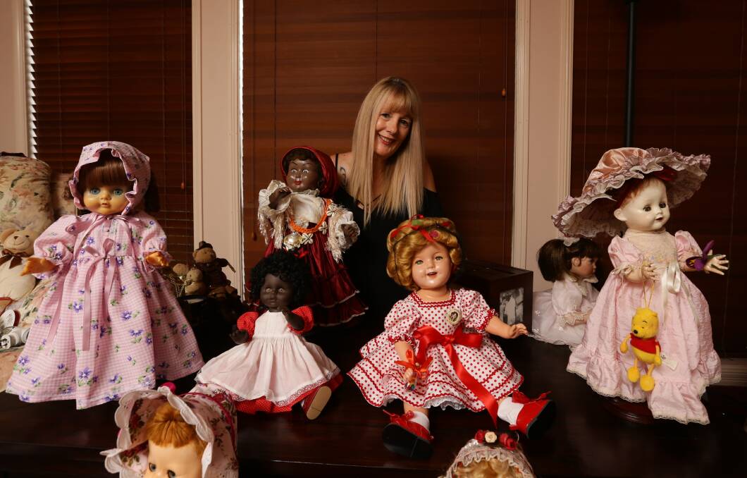 ALL DOLLED UP: Avid doll collector Sue Turner with some of her collection. Picture: Jonathan Carroll