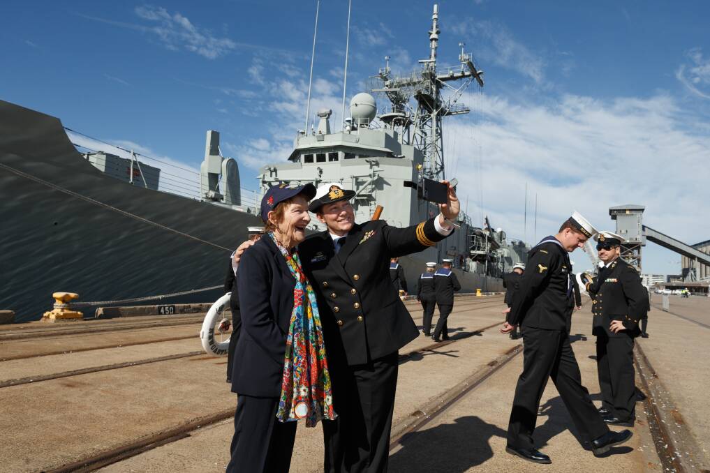 SELFIE TIME: Former Lady Mayoress Margaret McNaughton poses with the commanding officer of HMAS Newcastle, Commander Anita Sellick. 