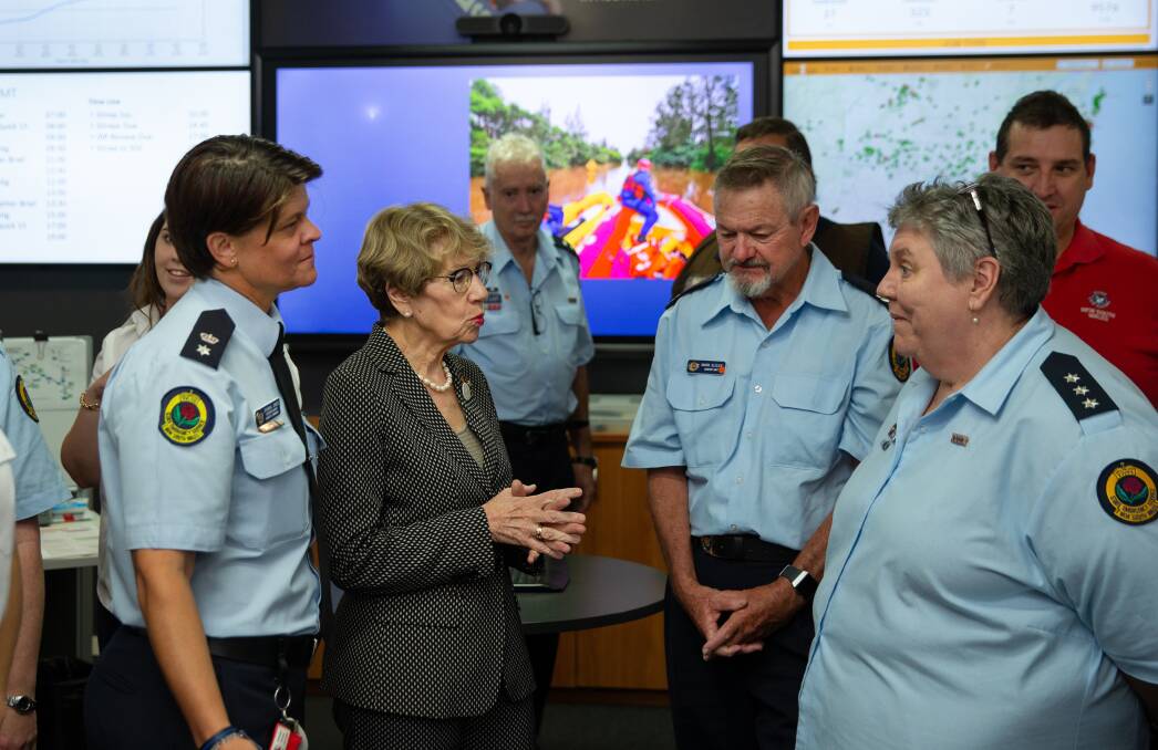 MEETING: The NSW Governor, Margaret Beazley, talks with workers at the SES headquarters in Maitland. Picture: Marina Neil