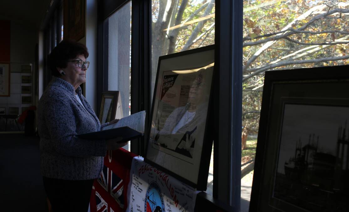 Lynda Forbes, who helped organise the union exhibition, holds documents belonging to her late husband, John, who was a seaman. Picture: Simone De Peak 
