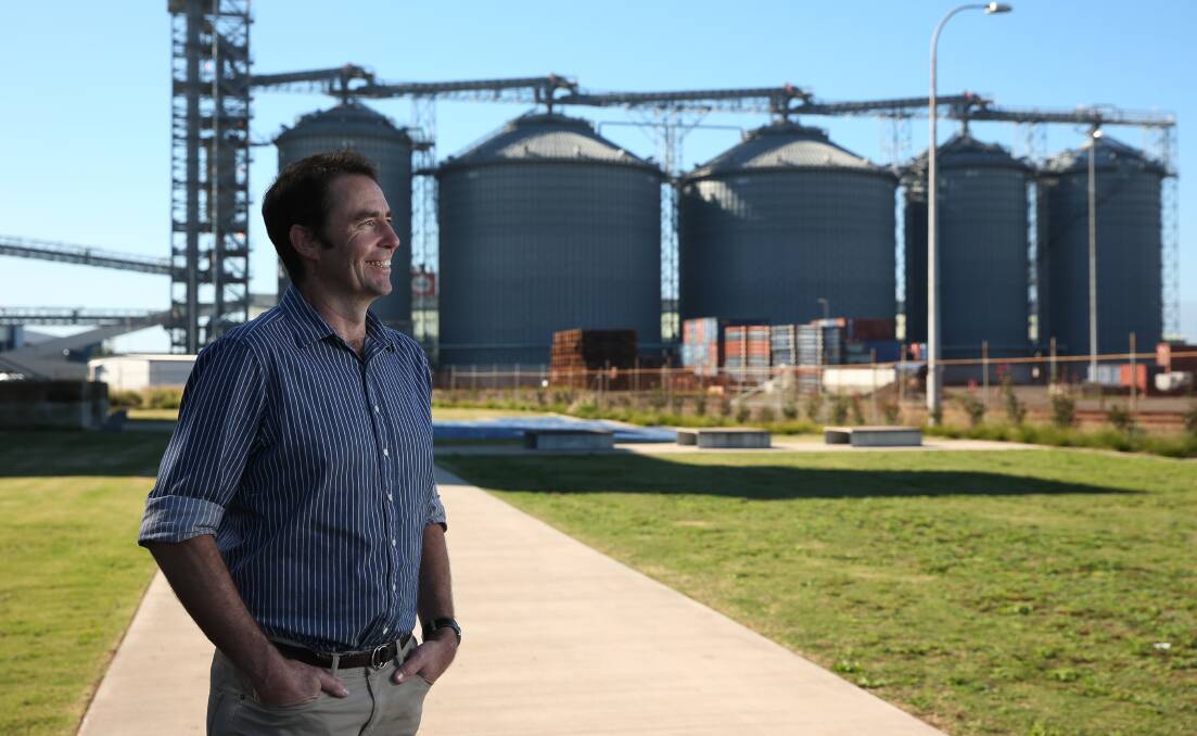 OPTIMISTIC: Jock Carter, co-CEO of Newcastle Agri Terminal, with the company's silos behind him at Carrington. Picture: Simone De Peak 