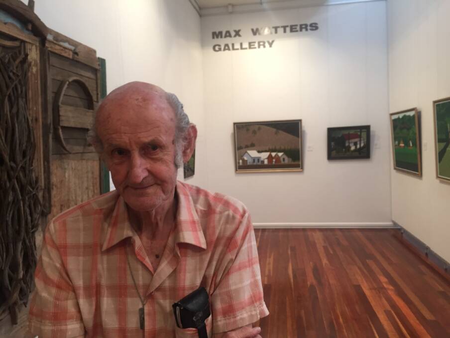 Max Watters in the gallery named in his honour in Muswellbrook, with his paintings in the background. Picture: Scott Bevan