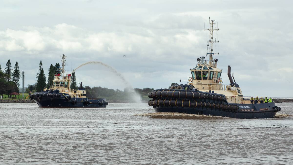 WELCOME HOME: The "Svitzer Glenrock" receives a water salute from the "Svitzer Myall" in Newcastle harbour. 