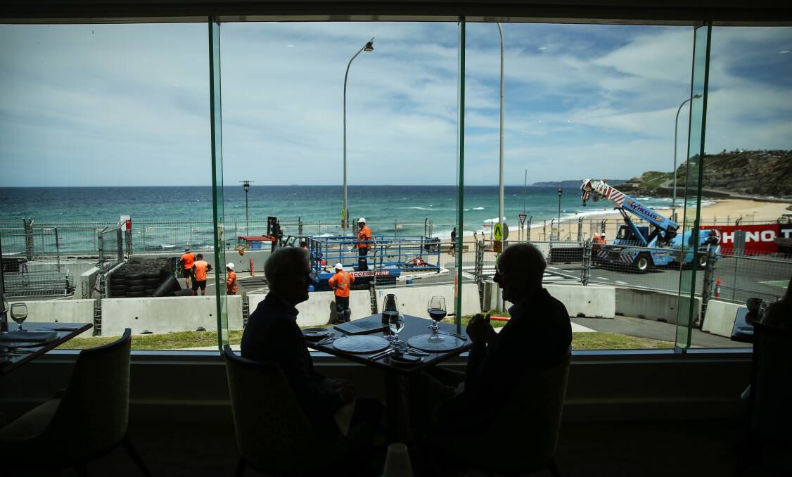 John Peschar at lunch with Scott Bevan, with a view to the work on the Supercars track and Newcastle beach. Picture: Marina Neil 