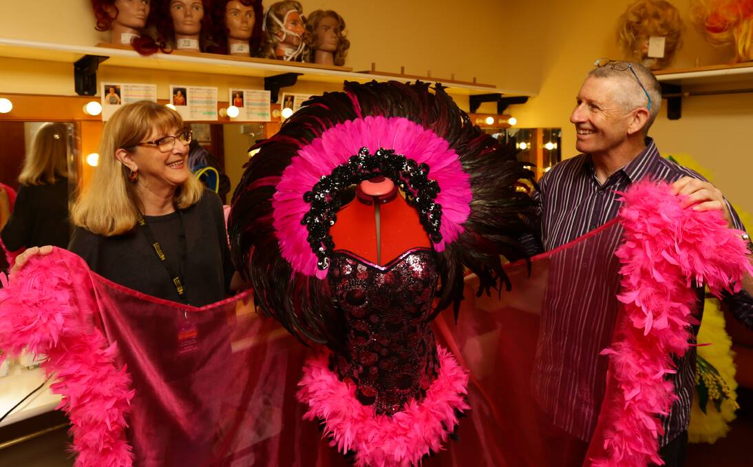 Costume designers Bev Fewins and Steve Harrison with one of their creations for "Priscilla, Queen of the Desert". Picture: Jonathan Carroll