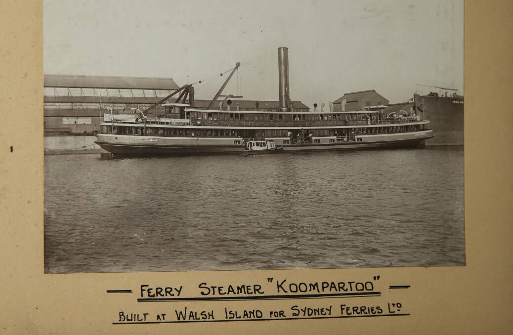 PAGES PAST: Photo of a ferry in the club's "Government Dockyard" album. 