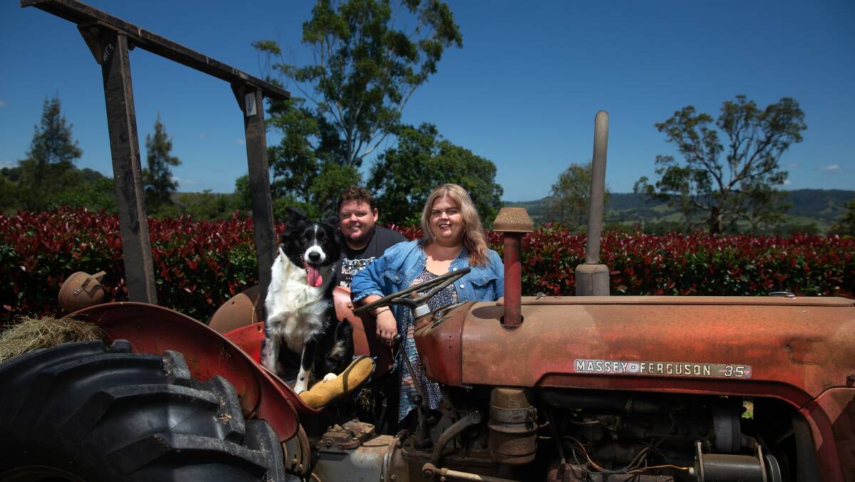 New arrivals in Dungog, Joe McFadyen and Katherine Ernst with their dog, Marley. Picture: Marina Neil