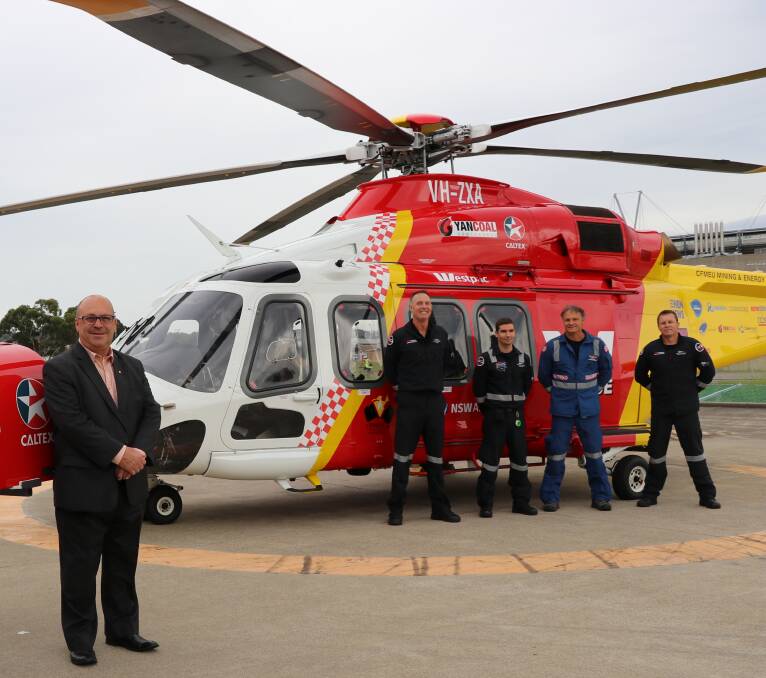 FUNDRAISING: Westpac Rescue Helicopter Service Northern NSW CEO Richard Jones, with crew members. Picture: Supplied