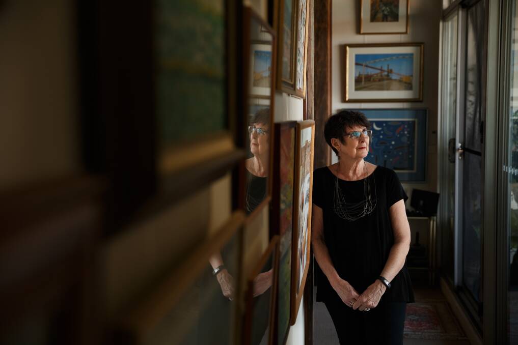 WORK LIFE: Artist Kerrie Coles in her apartment, where she also paints. Picture: Max Mason-Hubers