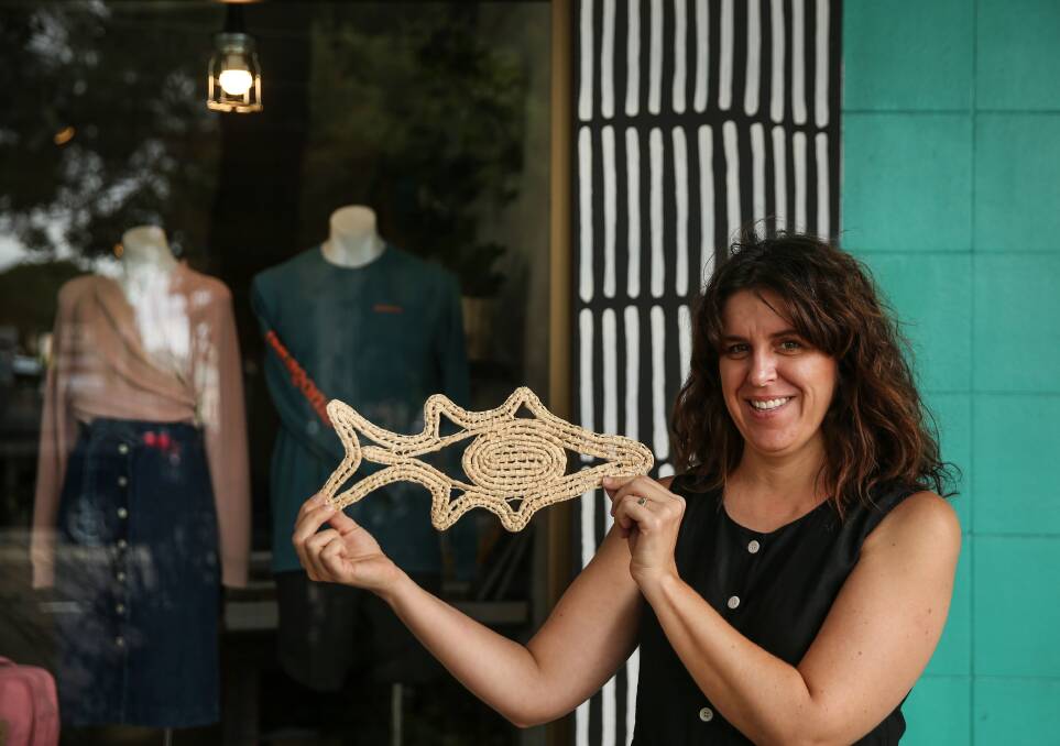 TRADITION: Yardsale Trading Co. owner Shellie Smith, with the mullet she created  using Awabakal weaving techniques. 