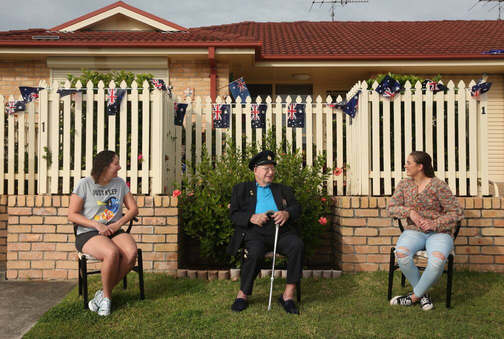 GENERATIONS: Veteran Jack Carter, centre, with granddaughters Stevie Carter and Sam Howard at the site of his driveway ceremony. Picture: Simone De Peak 